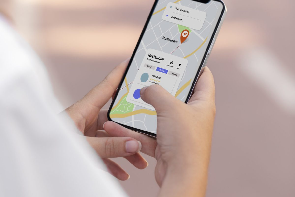 close-up-hands-using-maps-app